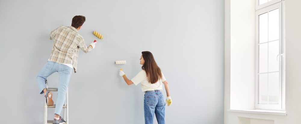 Married couple painting